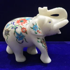 Elegant Marble Inlay Elephant Statue: Craftsmanship and Symbolism